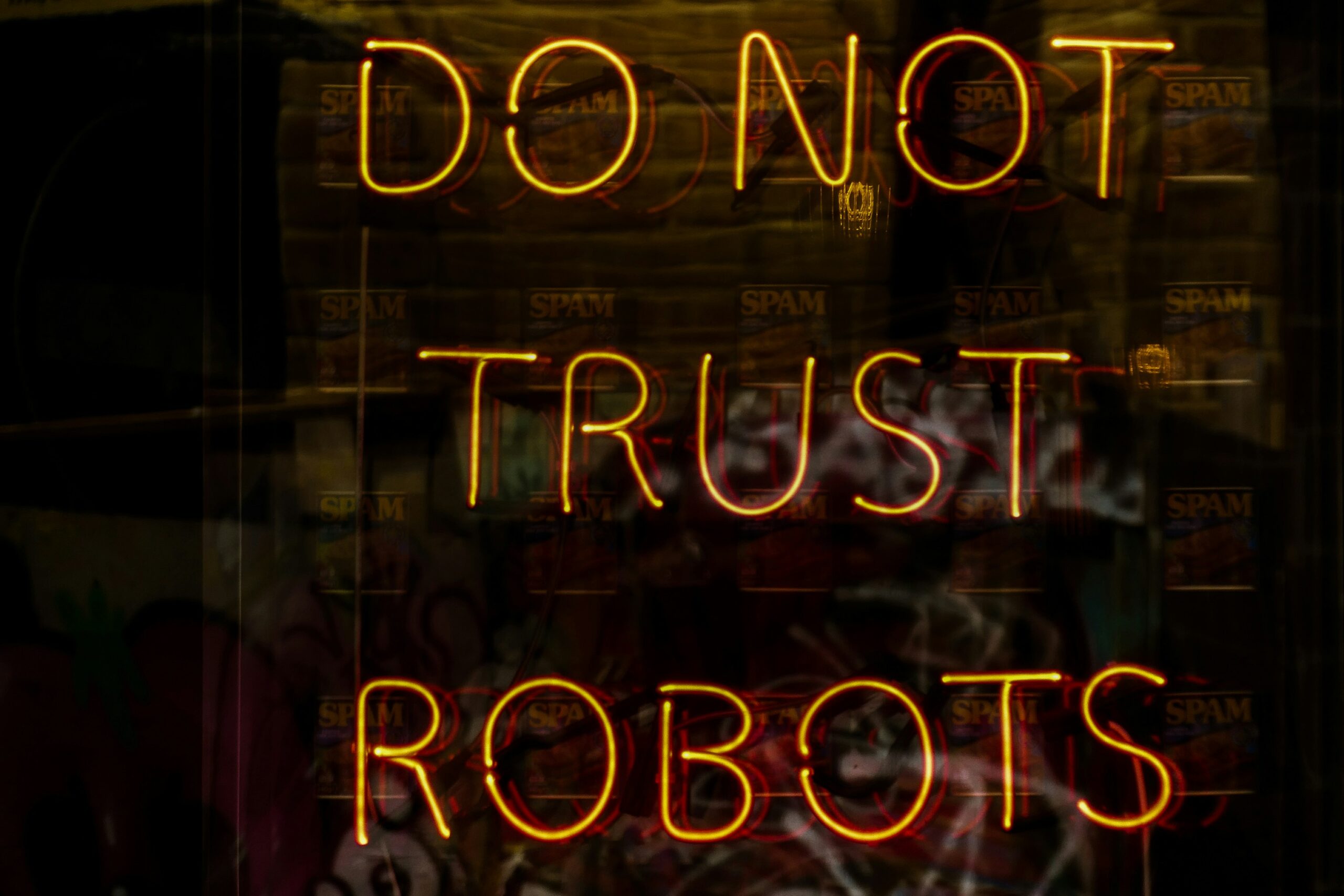 Do Not trust robots neon sign, taken by Nick Fewings from Unsplash